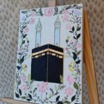 Kaaba & Minarets Wall Art in a Floral Frame  Hand-Painted 3D Islamic Painting | Masjid al-Haram Decor & Unique Muslim Gift